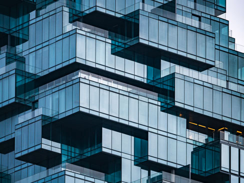 large glass building with multiple floors large glass building with multiple floors