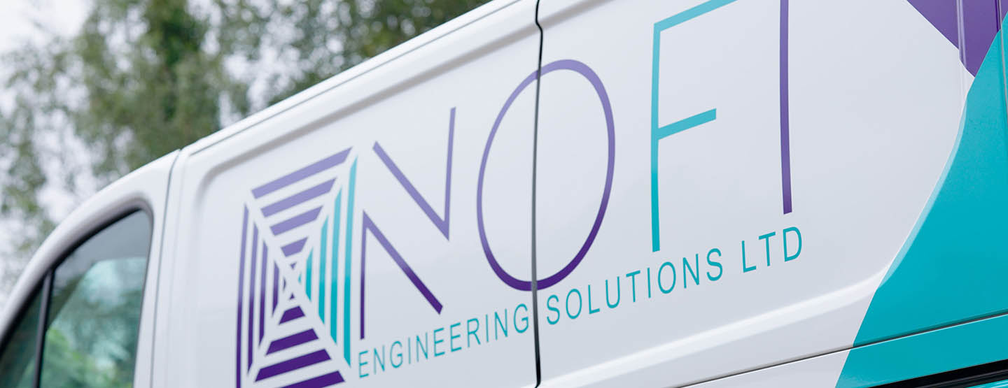 Side of NOFI white van Side of NOFI white van